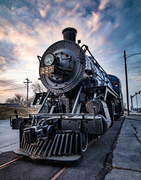 Antique blue locomotive on track