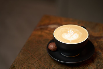 Barista making cappuccino, close-up