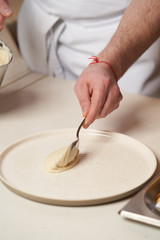Chef cooking mashed potato and grilled duck breast
