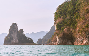 Naklejka premium Khao SOK national Park is nature reserve in South of Thailand with dense untouched jungles, limestone karst formations, an artificial lake Cheo LAN Surat Thani. beautiful sunny day. February 26, 2020