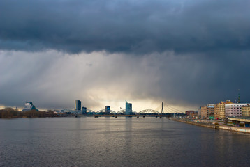 view of the city of Riga from the island bridge