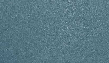 Obraz premium Granular abstract uniform grainy surface. Rough texture background.