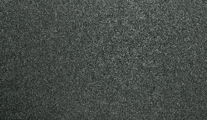Granular abstract uniform grainy surface. Rough texture background.