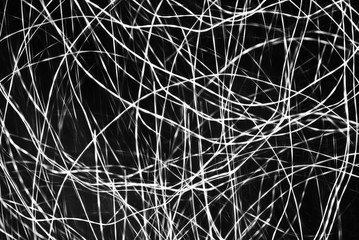 background of white lines on a black background, glowing lines