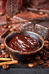 Chocolate body skin treatment on wooden background