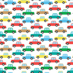 Bright multi-colored cartoon cars isolated on white background. Baby seamless pattern. Vector graphic illustration. Texture.