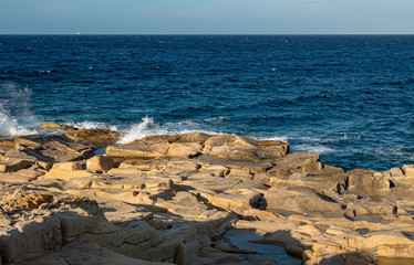 Fototapeta na wymiar Blue water at the coast of Malta - travel photography