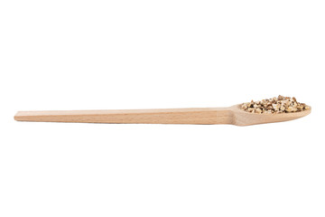 dandelion root or in latin Taraxaci radix in wooden spoon isolated on white background. medicinal healing herbs. herbal medicine. alternative medicine