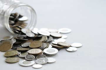 Canadian Coin Spilling Out Of Bank