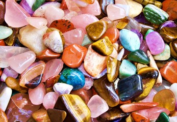 Assortment of precious stones.  A mix of different colored gems.