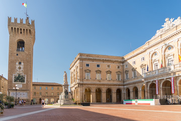 Fototapeta premium Town Hall in Giacomo Leopardi Square with the monument dedicated to the poet, Recanati Town, Italy