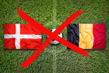 Canceled soccer game, Denmark vs. Belgium flags on soccer field