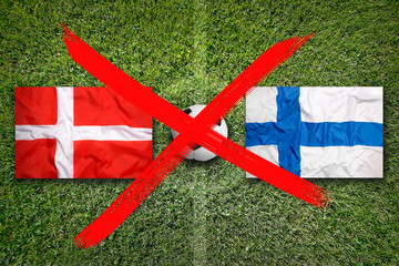 Canceled soccer game, Denmark vs. Finland flags on soccer field
