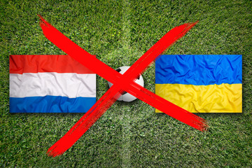 Canceled soccer game, Netherlands vs. Ukraine flags on soccer field