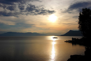 A beautiful sunset in the sky with clouds