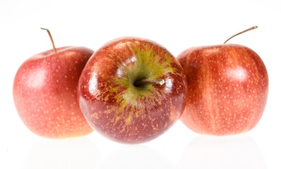 Juicy red apples isolated on white background