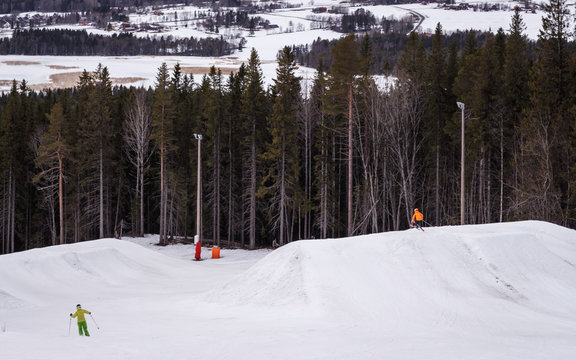 Two skiers on the ski slope on the island of Frösön