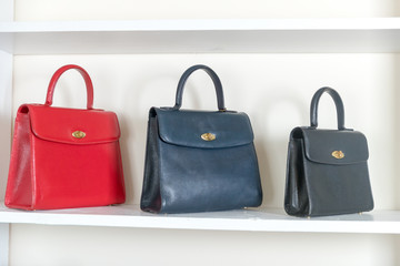 Naklejka premium Vintage bag on the white shelf - Image