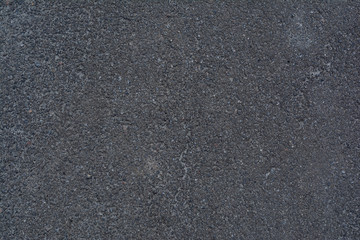 Dark asphalt background. Full Frame Shot Of Asphalt Road