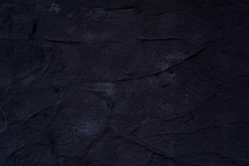 Black abstract plaster surface background