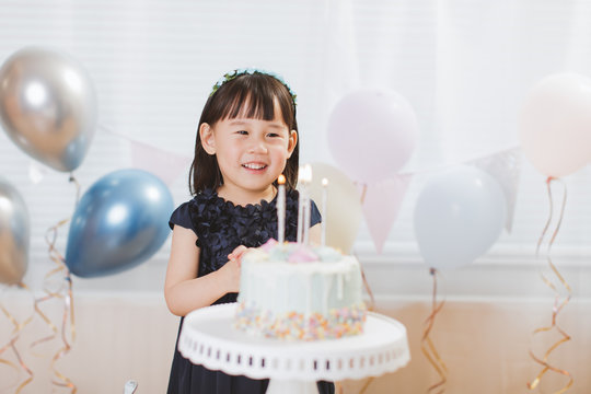 toddler girl celebrating her 4th birthday at home