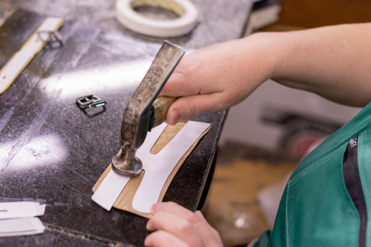 Shoe production process in factory, leather shoemaking