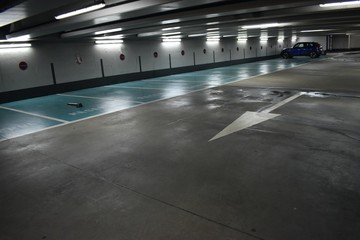 Underground parking space with many empty spaces