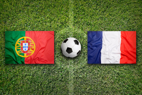 Portugal vs. France flags on soccer field