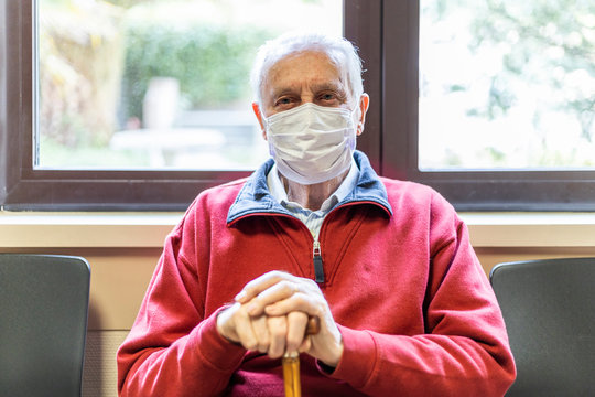 elderly man in a hospital with respirator