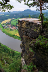 A rock and the river Elbe in Saxon Switzerland near Dresden