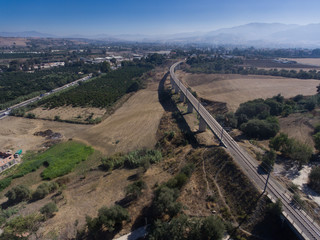 railway bridge with mountains