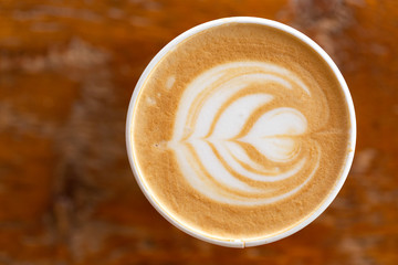 Overhead View of a Fresh Latte on Wooden Table
