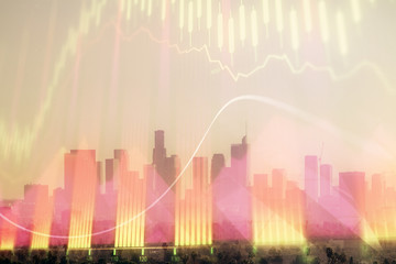 Naklejka premium Forex chart on cityscape with skyscrapers wallpaper double exposure. Financial research concept.