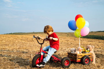 Summer vacation concept. Kids dreams and Enjoyment. Kid having fun at countryside.