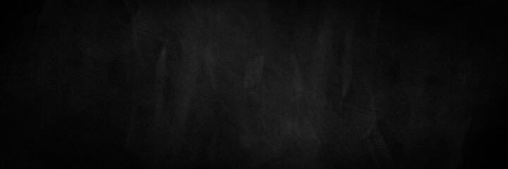 wide Chalkboard texture background. blackboard wall backdrop wallpaper, dark tone. black banner billboard.