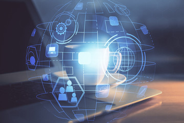 Computer on desktop with social network hologram. Multi exposure. Concept of international people connections.