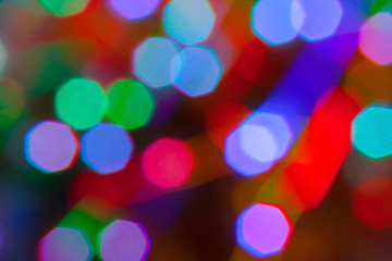 Colorful defocused bokeh lights in blur night background