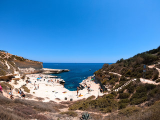 Fototapeta na wymiar People enjoying the natural pool of Malta.
