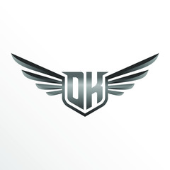 Initial Letter DK with Wings