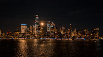 Fototapeta na wymiar Aerial view of NewYork City and downtown skyline from Hudson River at night