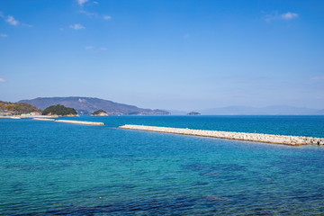 Fototapeta na wymiar Landscape of coast and breakwaters in the seto inland sea (tsuda, higashikagawa city) kagawa, shikoku, japan)