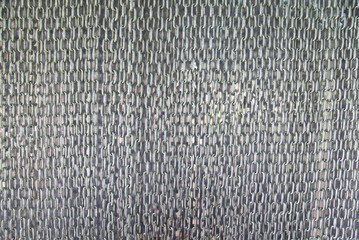 Metal curtain on the entrance of bird park.