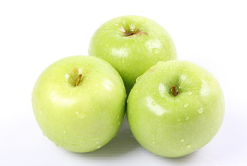 Green apples on a white background