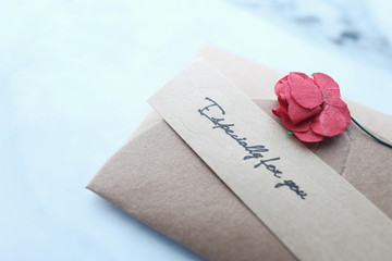 close up of envelope on tiles background for valentine day .
