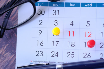 deadline concept with push pin on calendar date 