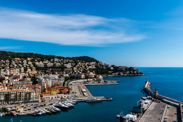 Fototapeta na wymiar The panoramic view of the old port, the lighthouse and the Mediterranean Sea in Nice, France (Côte d'Azur / French Riviera / Provence)