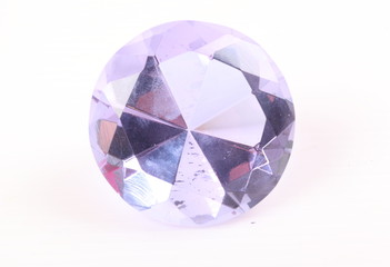 purple diamond on white surface