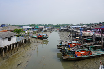 Fototapeta na wymiar Pulau Ketam is an island at the mouth of the Klang River, near Port Klang. It host Chinese fishing villages comprising houses on stilts and the boat is the main transport here. 