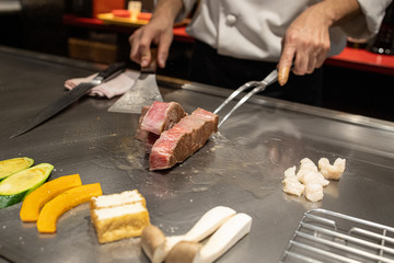 chef cutting kobe beef a5 steak