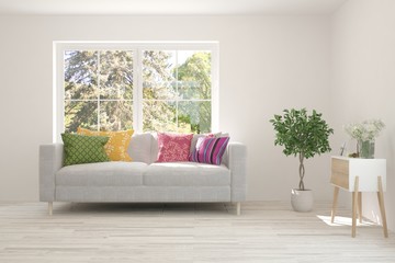 Modern living room in white color with sofa. Scandinavian interior design. 3D illustration